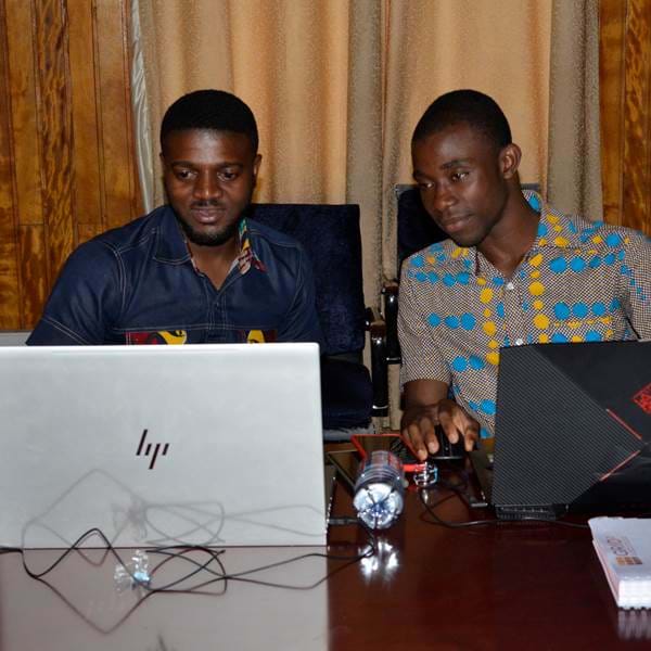 GRID3-GHA-GSS, two staff by computers